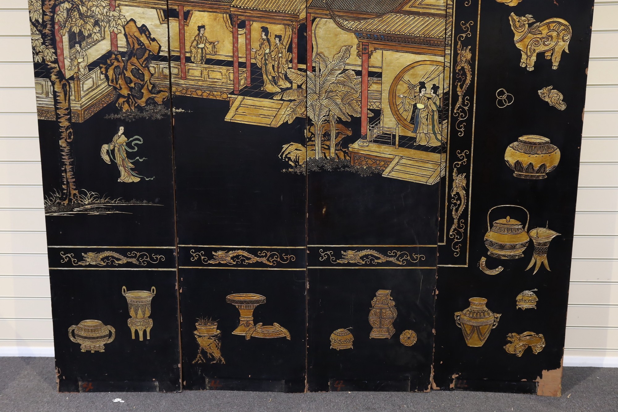 A Chinese coromandel lacquer twelve panel screen, 19th century, each leaf panel width 49cm, height 264cm